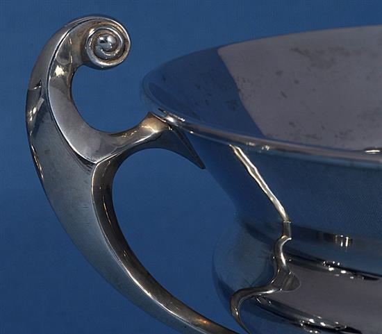 A pair of Edwardian Art Nouveau silver two handled pedestal bowls,